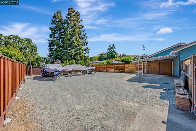 Building Photo - 5891 Caulfield Dr