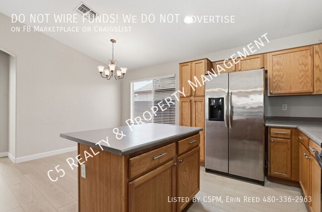 Building Photo - 12541 W Woodland Ave