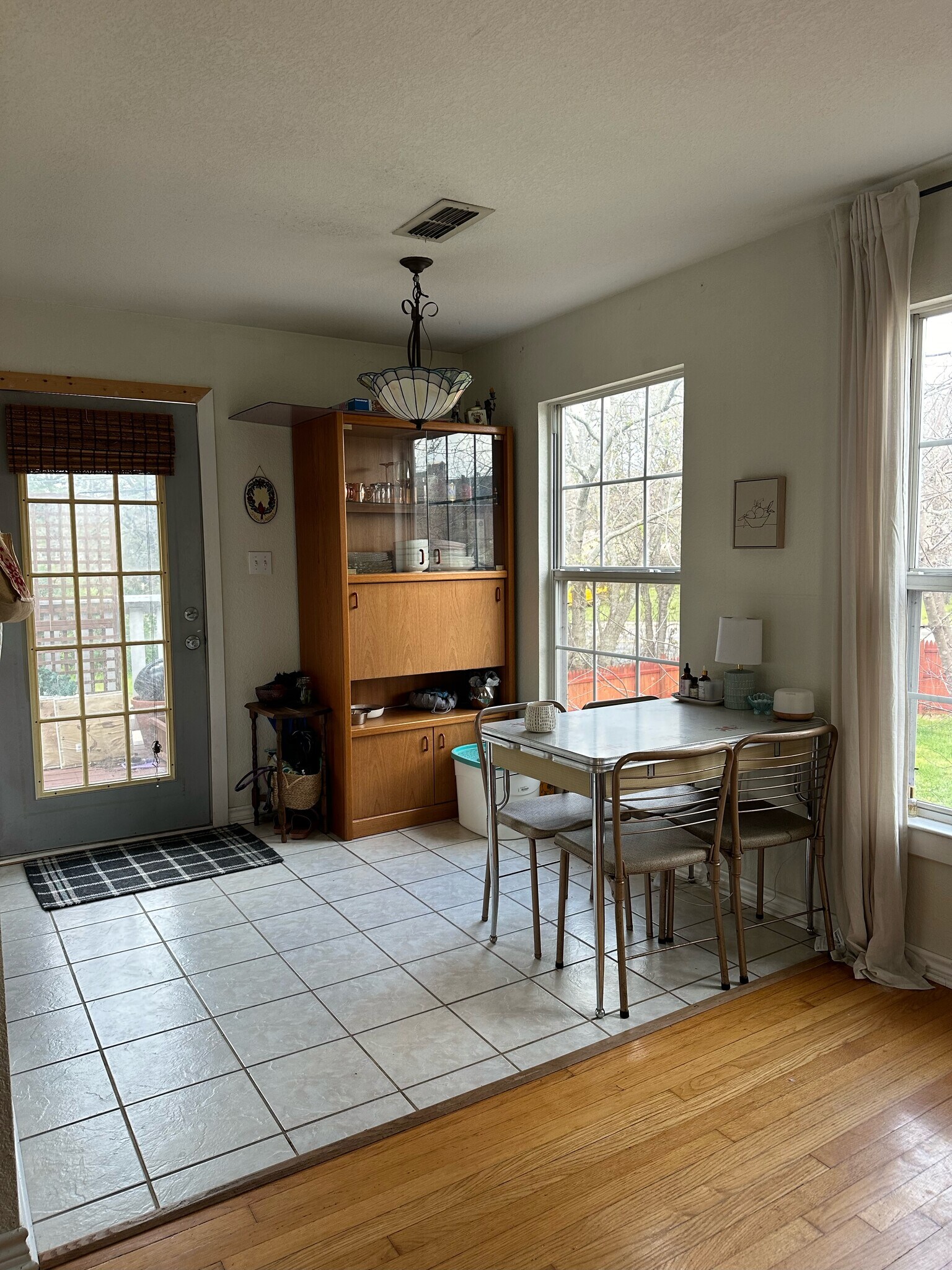 Dinette and entry. The kitchen is on the left. 940-383-2500 - 2019 N Bell Ave