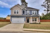 Building Photo - Discover comfort and convenience in this spacious 4-bedroom home, brimming with amenities, locate...