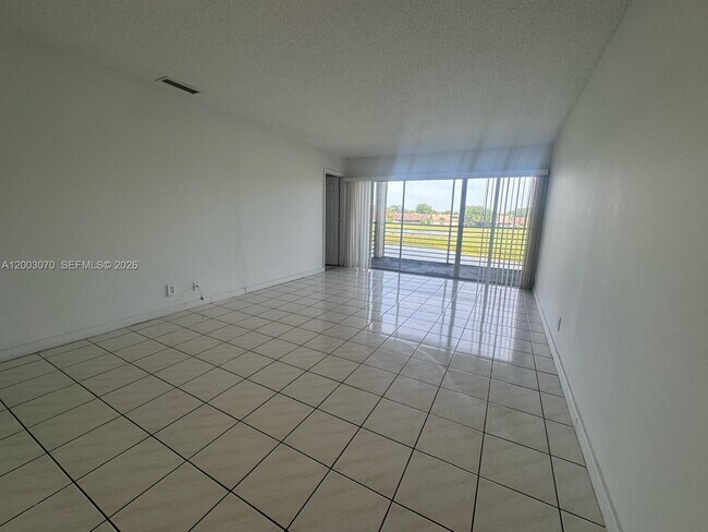 Building Photo - 7410 Woodmont Terrace