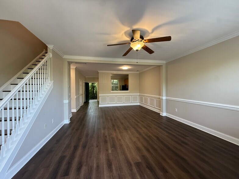 Open family room and dining area flows into kitchen. - 137 High Ridge Rd