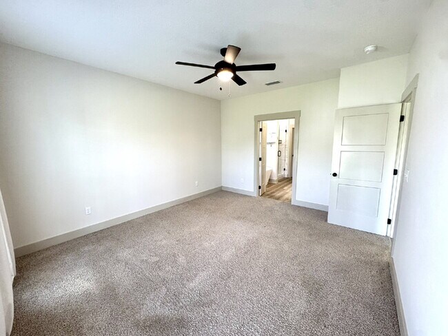 Building Photo - Need Space?  How about 5 bedrooms, 2.5 baths + an extra bonus area upstairs so that the kids can ...
