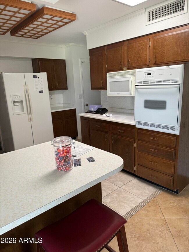 Building Photo - 10659 W Tropicana Cir
