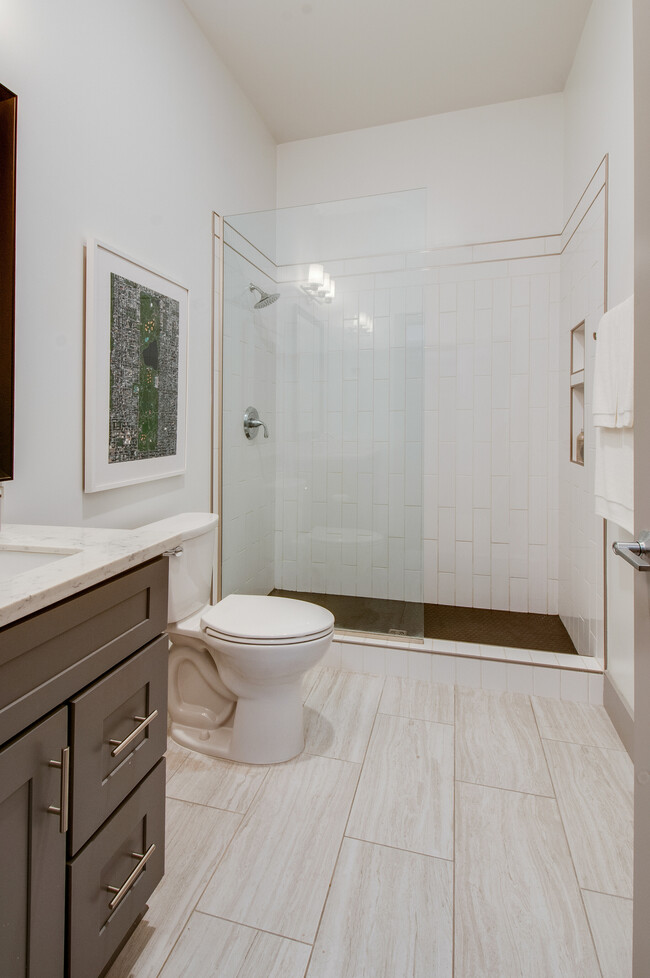 Frameless walk-in shower with tons of space and built-in's. - 2407 8th Ave S