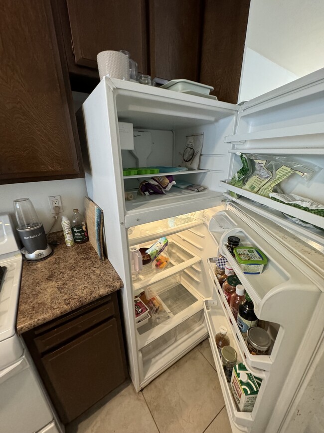 refrigerator with freezer - 33966 Malaga Dr