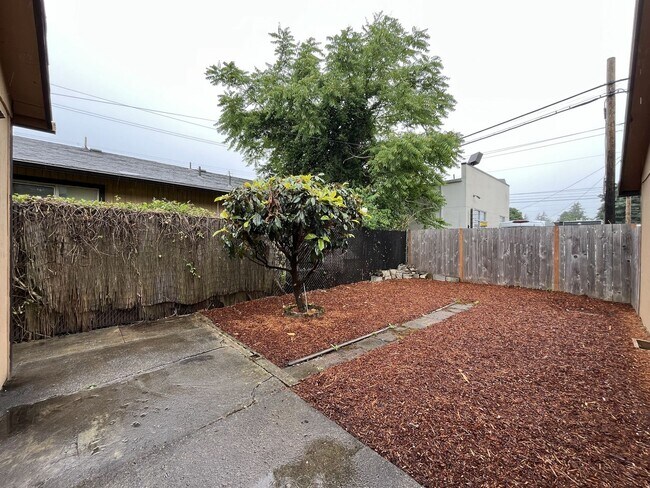 Building Photo - Inviting 2 Bedroom Home with Open Layout, Stainless Steel Appliances & Private Outdoor Retreat