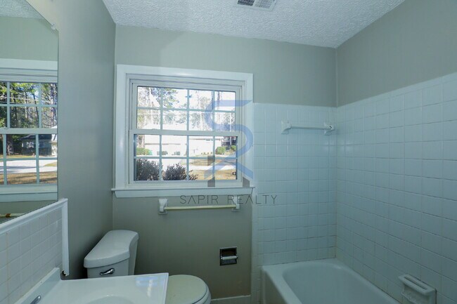 Building Photo - Move in before January 31st and choose your reward: a $250 Amazon Gift Card or a 55" Smart TV!