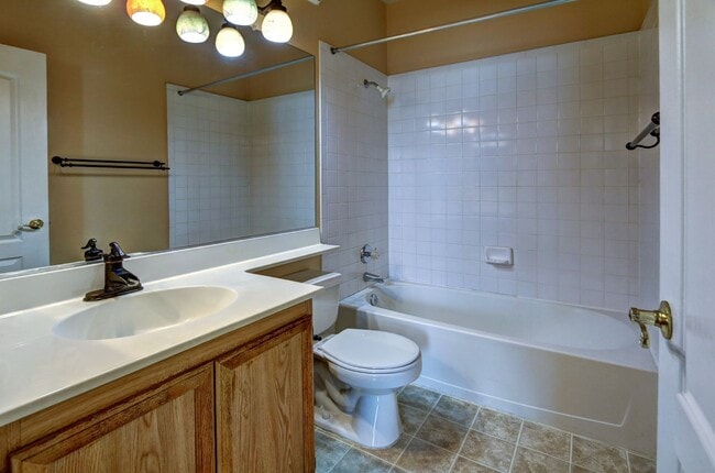 Building Photo - FANTASTIC HIGHLY UPGRADED UNIT FACING THE PARK AND POOL.