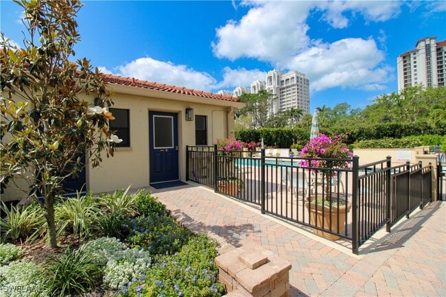 Building Photo - 7024 Pelican Bay Blvd