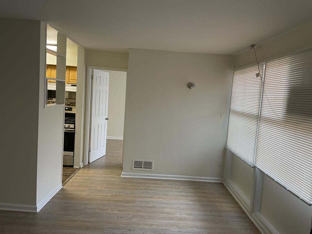 DINING AREA, KITCHEN & BEDROOM ENTRANCE - 7400 18th Ave Unit # 106