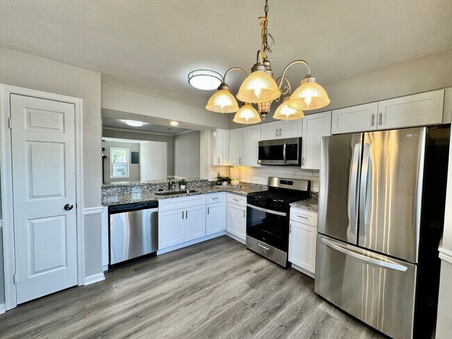 Building Photo - COMPLETELY Updated & Ready 08-21-26!! Sparkling Community Pool - Pet Friendly - Fenced Backyard!