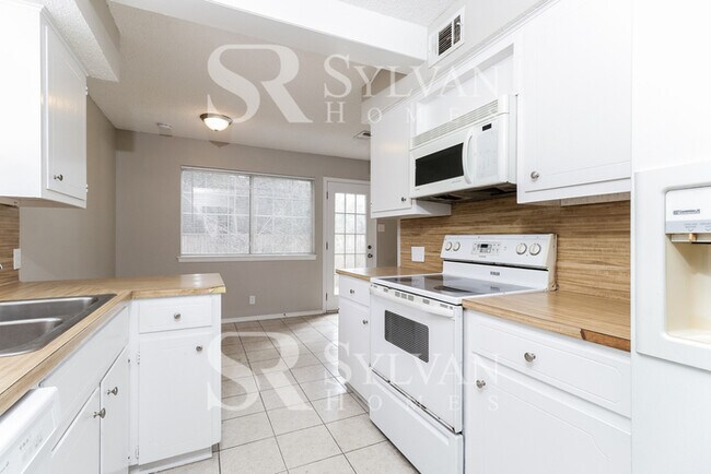 Building Photo - Turn the key. Enter. Smile. Repeat every day!