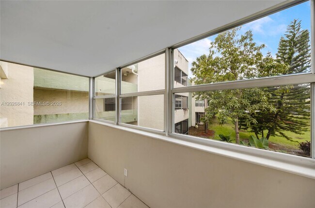 Building Photo - 6075 N Sabal Palm Blvd