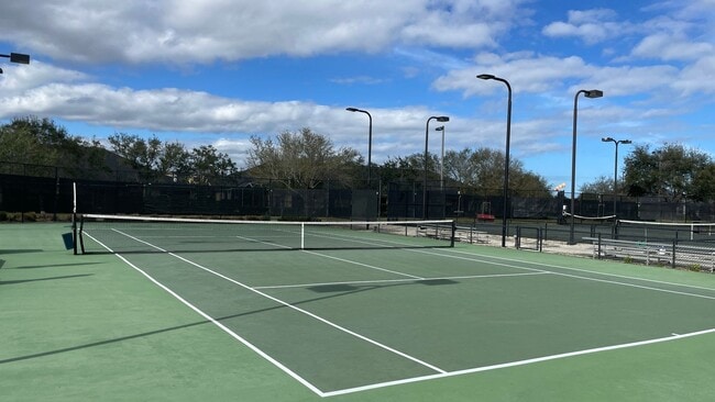 Building Photo - Elevated Luxury at The Terraces – 4th Floor Lake & Golf Course Views! 55+ Community!