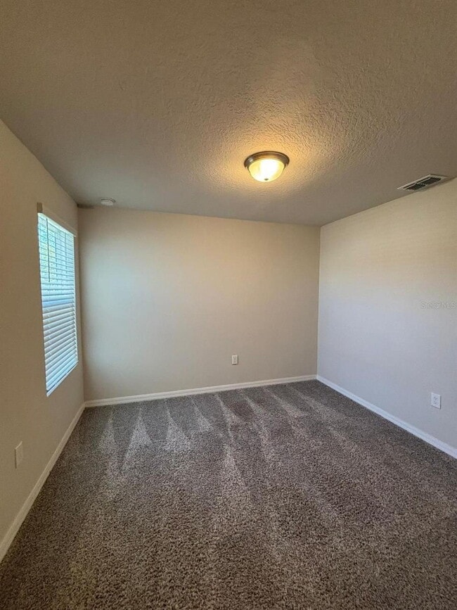 Building Photo - This beautiful townhouse features an abundance of space and natural light.
