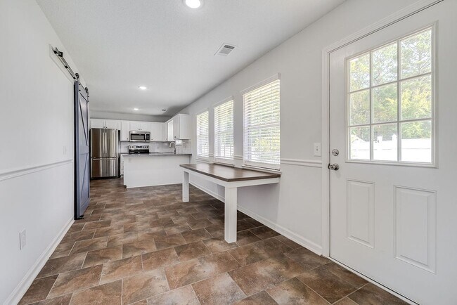 Building Photo - Updated 3BR Home with Fenced Yard in the H...