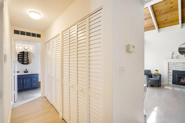 Building Photo - Spacious 1,550 Sq Ft Townhome | 2-Car Garage & High Ceilings w/ Exposed Beams