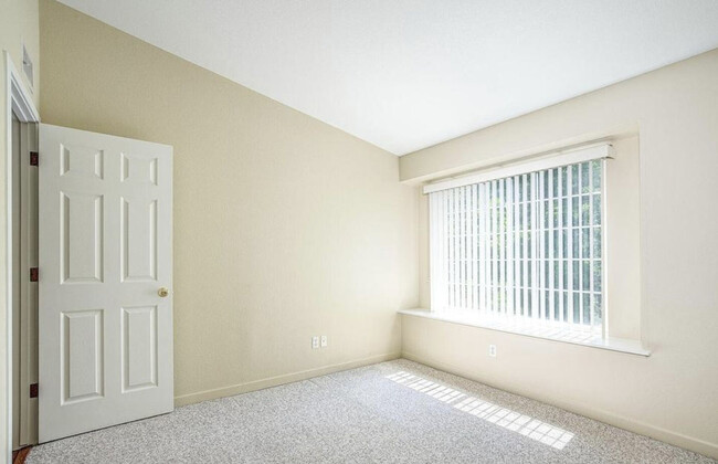 Main Bedroom with Window Seat and view to Pond - 1225 W Prospect Rd