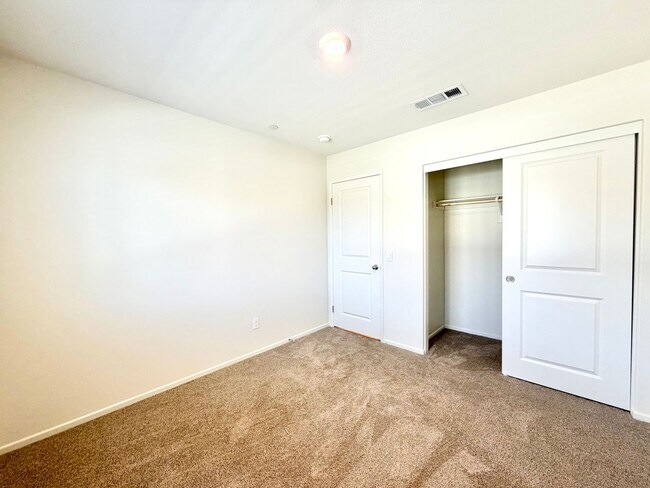 Building Photo - Modern 4 Bedroom 3 Bathroom Living with INCLUDED Solar & Entertainer’s Backyard