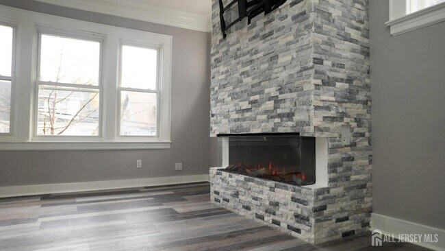 Building Photo - 65 Poe Ave