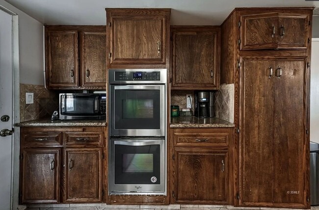 Building Photo - Beautiful Solar-Powered 4 Bedroom Home