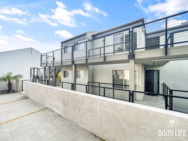 Building Photo - Bright 2BR Condo with New Carpet, Private Balcony & Great Amenities in Clairemont Mesa!