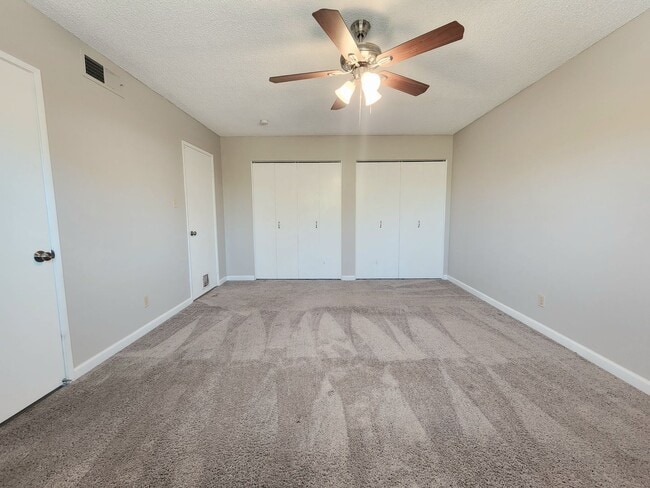 Building Photo - 4 Bedroom Two-Story Home with Downstairs Primary Bedroom & Fireplace