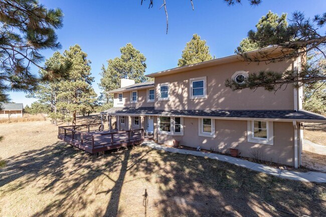 Building Photo - Spacious Country Retreat on 5.5 Acres | Barn, Deck & Pikes Peak View!!