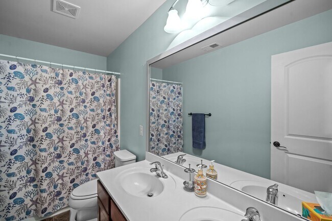 Building Photo - Relax by the Water – 4BR Home with Pond Views in Creekside