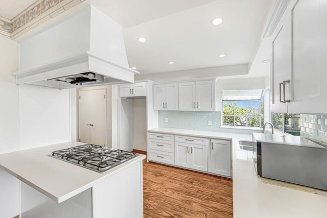 Building Photo - This stunning 5 Bed / 3 Bath Home South of Ventura Boulevard with pool and panoramic views is now...