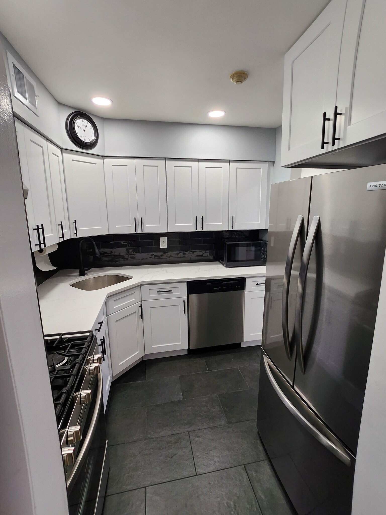 New kitchen white marble counter top stainless steel appl & gas stove - 49 Fairview Cir