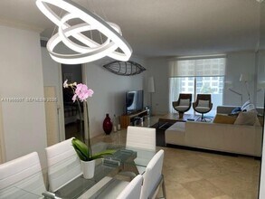 Building Photo - 5555 Collins Ave