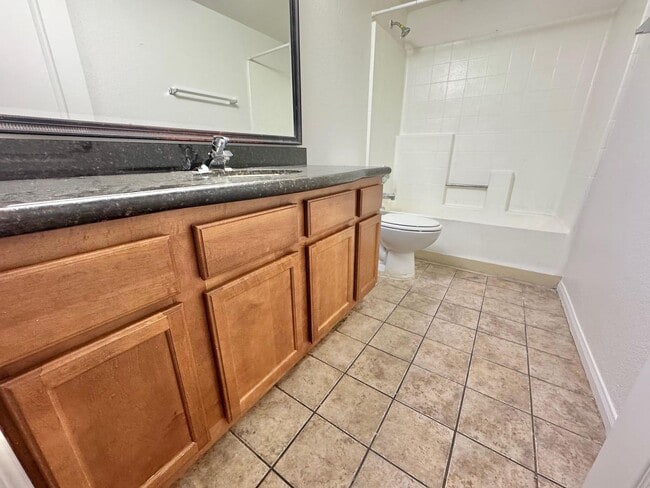 Building Photo - SPACIOUS 3 BEDROOM GROUND FLOOR CONDO