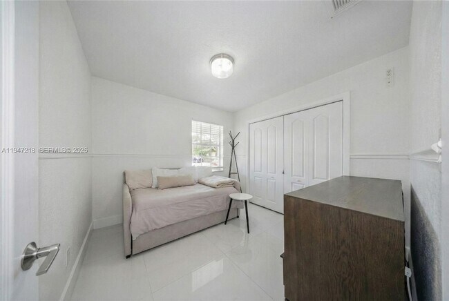 Building Photo - 10731 SW 51st Dr