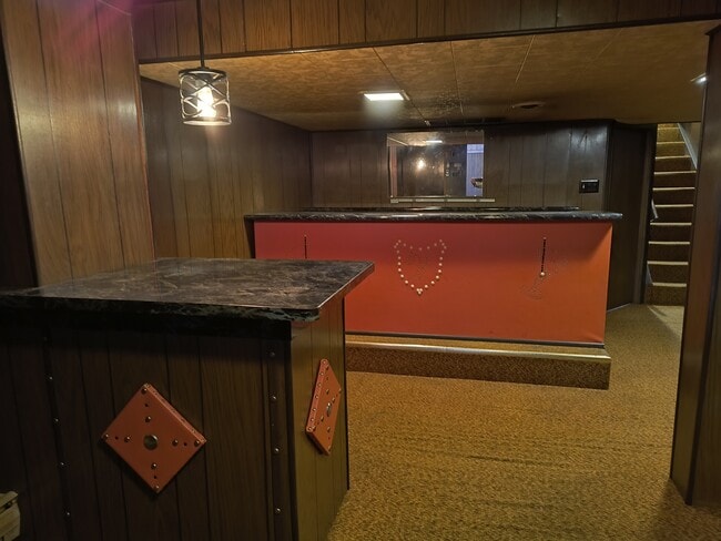 Lower level family room with wetbar. - 2227 23rd St S