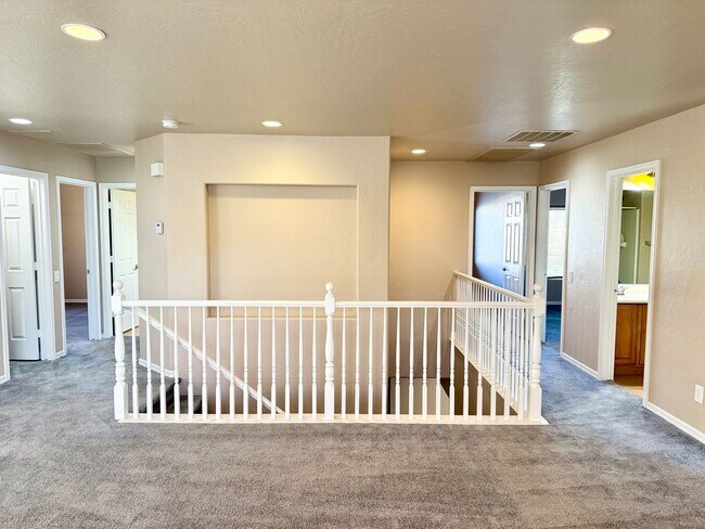 Building Photo - FIVE BEDROOMS, THREE FULL BATHROOMS, THREE...