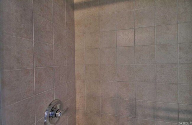 Building Photo - Modern 2BR/2.5BA Condo with Ensuite Bathro...