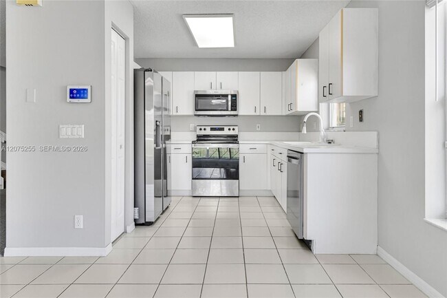 Building Photo - 3884 NW 63rd Terrace