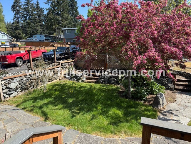 Building Photo - Spacious 4-Bedroom Upper-Level Home with Fireplace, Bonus Room & Large Deck