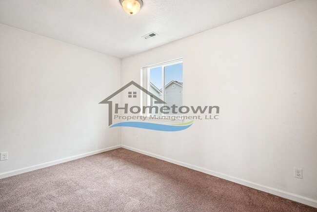 Building Photo - Townhouse Style Home with 3 Bedrooms, 2.5 Bathrooms, and a 2-Car Attached Garage Available in Coe...