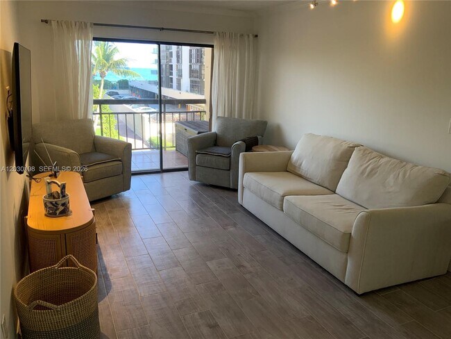 Building Photo - 6444 Collins Ave
