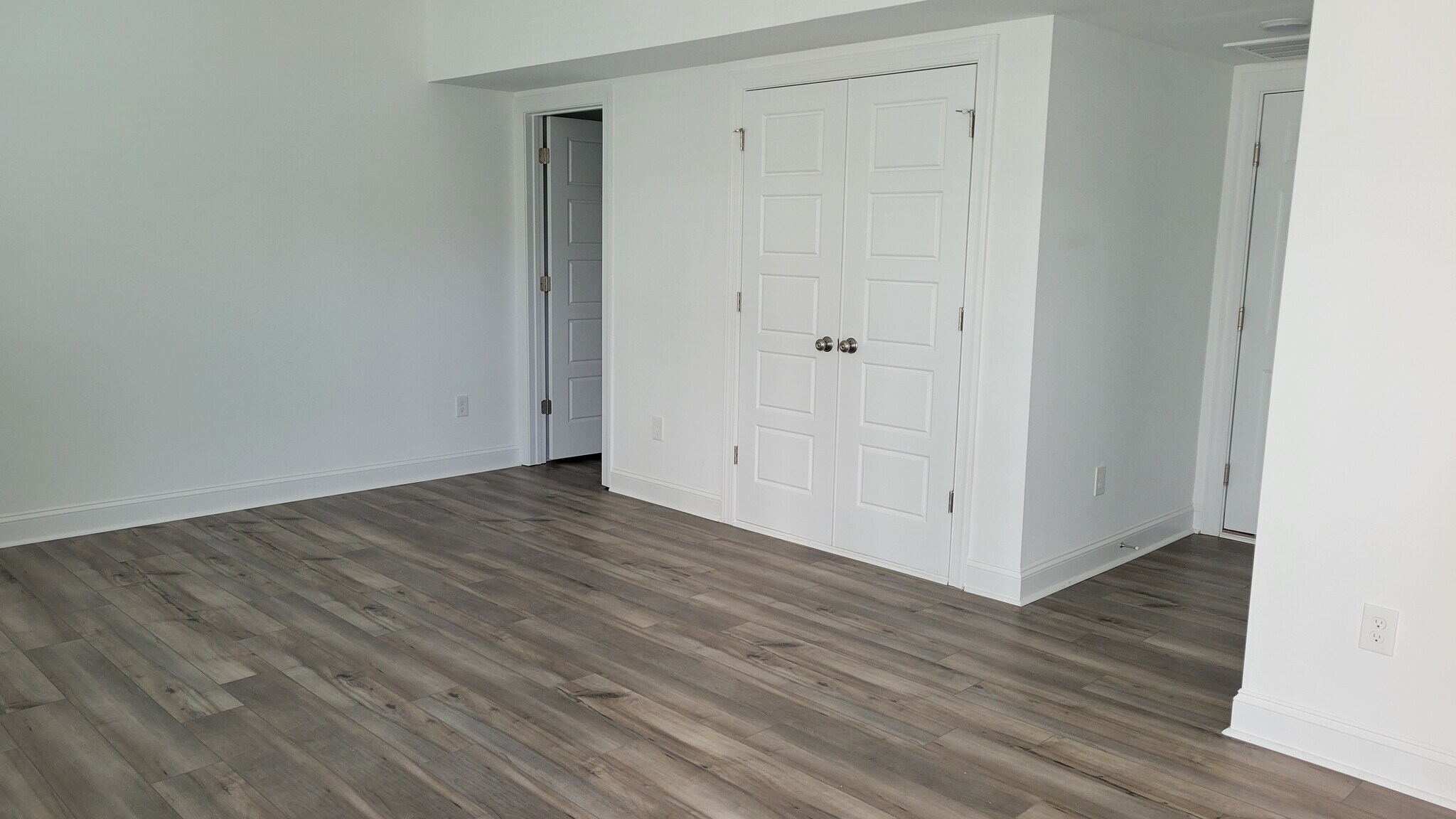 Flex room on lower level - storage space with custom shelving - 506 Village Branch Ln