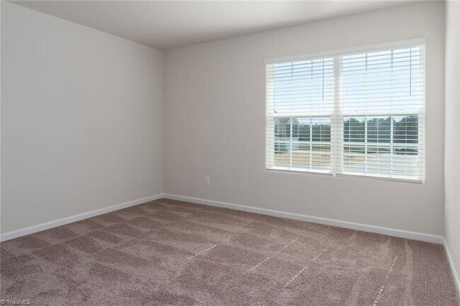 Building Photo - Spacious 3-Bedroom + Loft Home in Meredith Woods – Stylish, Efficient, and Perfect for Entertaining!