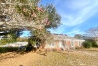 Building Photo - Brick one level home, Live Oak Tree, 3-4 bedrooms, fenced yard, deck.