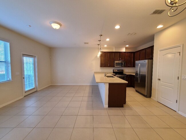 Building Photo - 3br 2.5ba at OVIEDO ON THE PARK. Tile floo...
