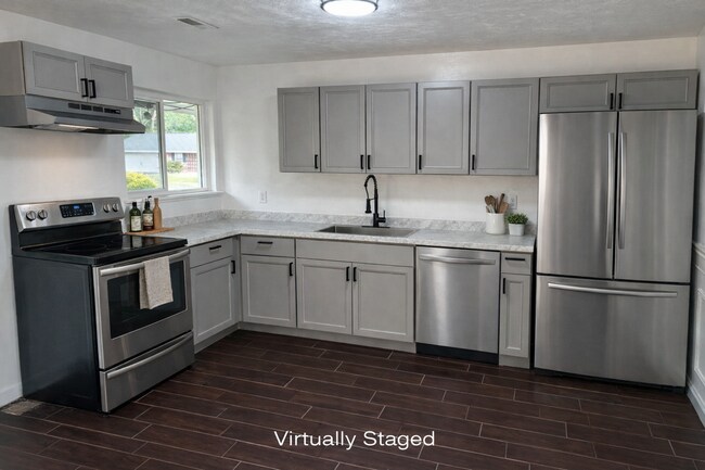 Building Photo - Elida Schools Home – 2-Car Garage & Spacious Yard