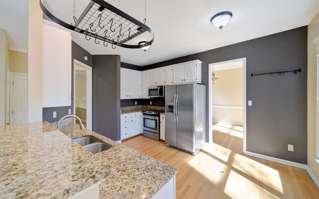 Building Photo - Bright + Spacious 4 Bedroom Home w/ Walkout Basement in Chestnut Bluffs of Woodcroft!