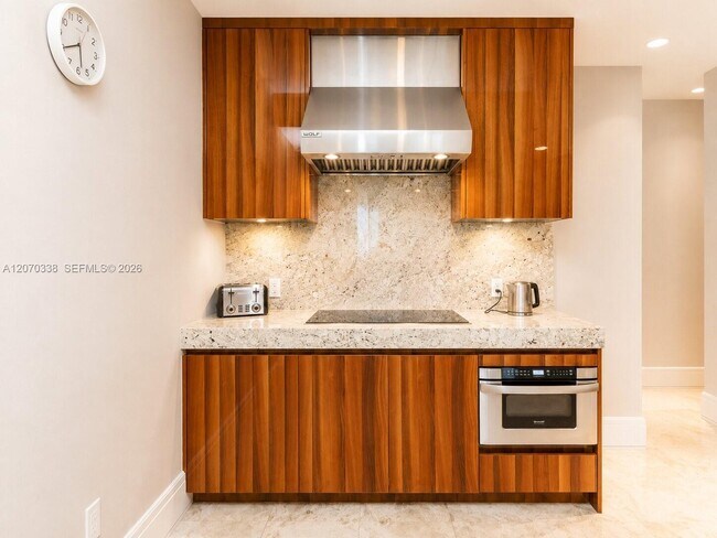 Building Photo - 9705 Collins Ave