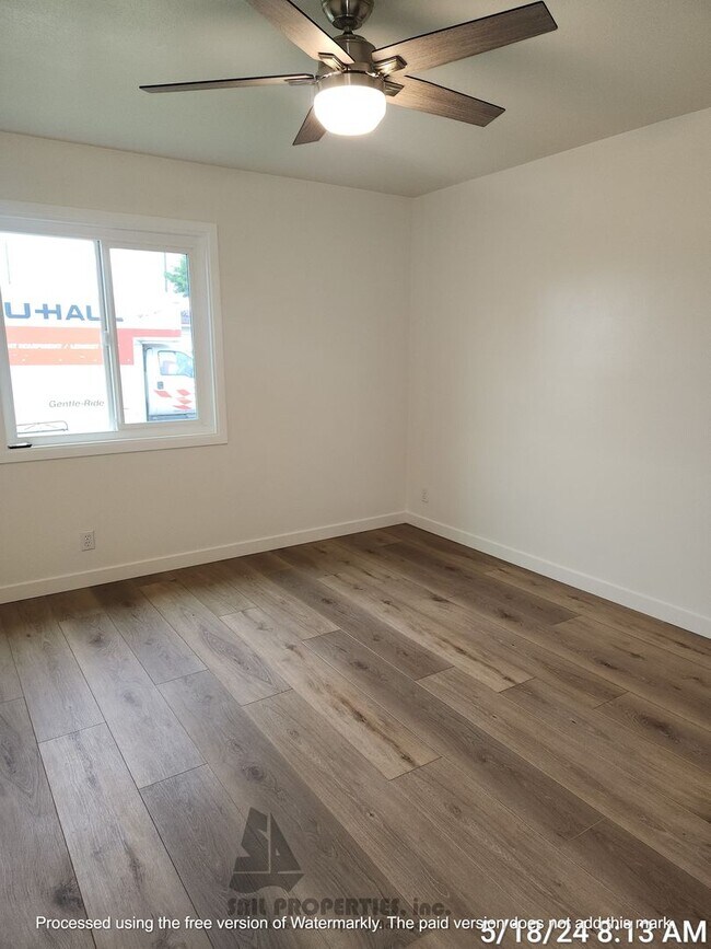 Building Photo - Welcome to this stunning 4-bedroom, 3-bath...